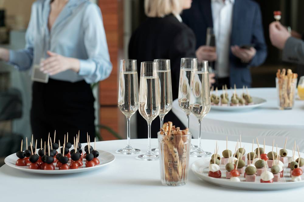 3 -plates-with-appetizing-canape-group-champagne-flutes.jpg