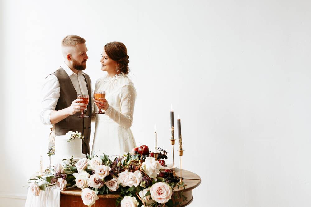 5 bride-groom-holding-glasses-their-hands.jpg