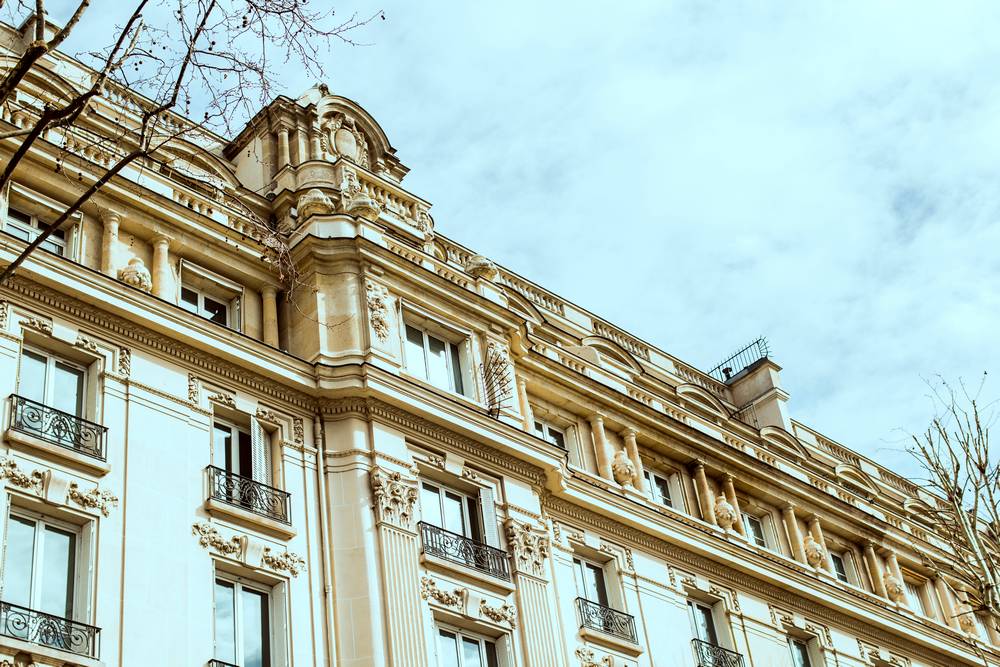 10 -angle-view-historic-building-against-cloudy-sky.jpg