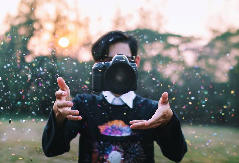 4 throwing-camera-amidst-confetti.jpg